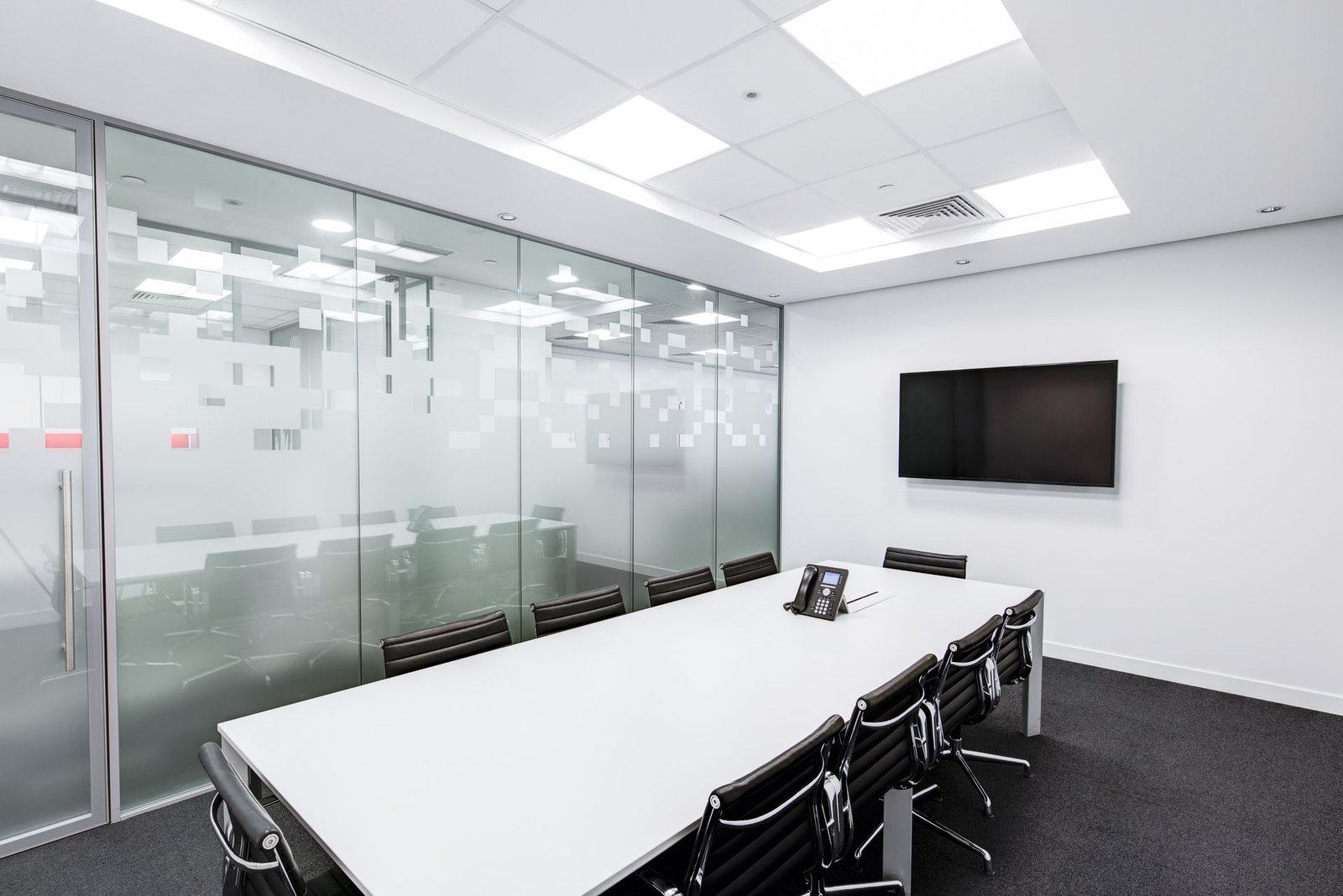 Meeting room with a wall-mounted display