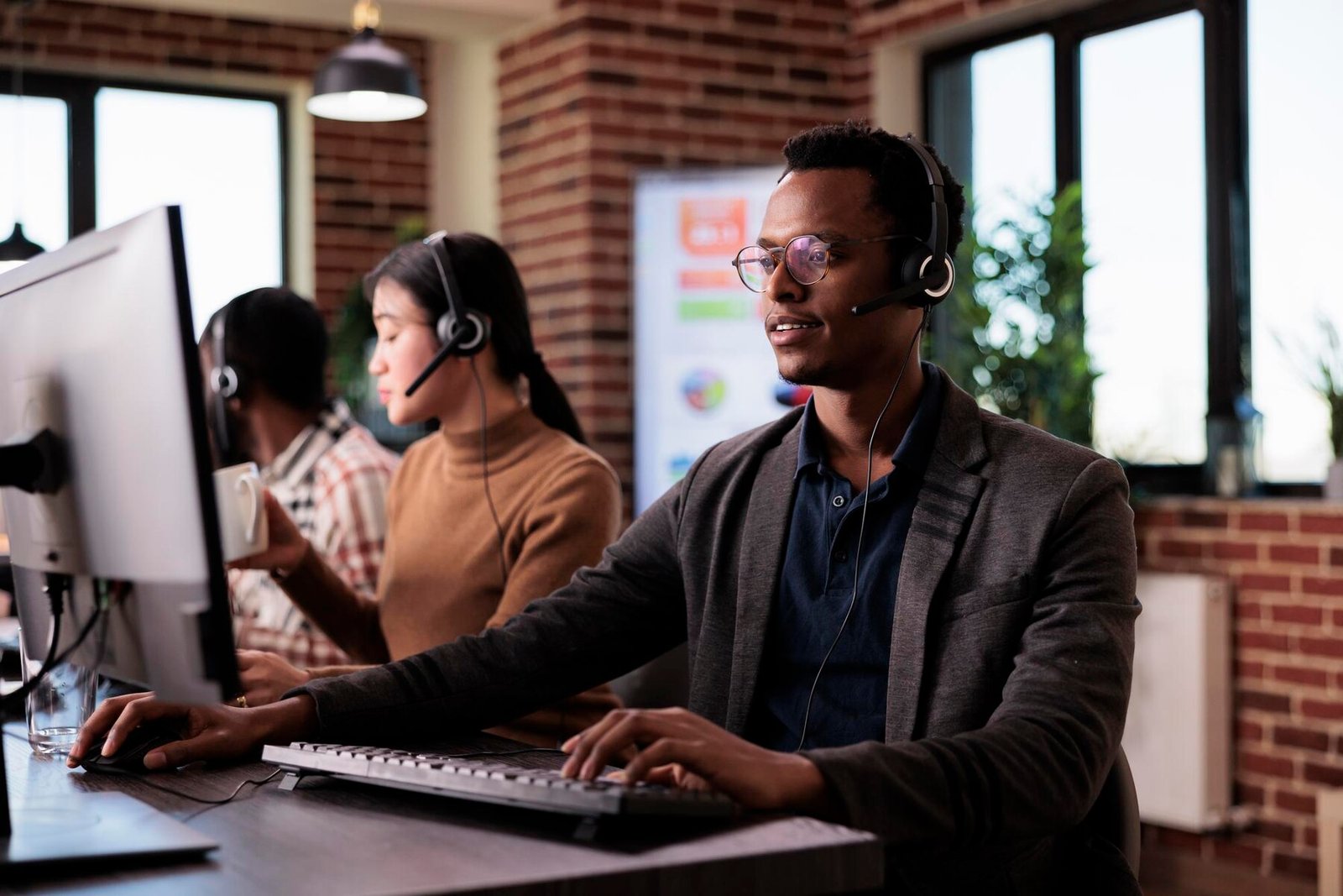 Service desk team on headsets